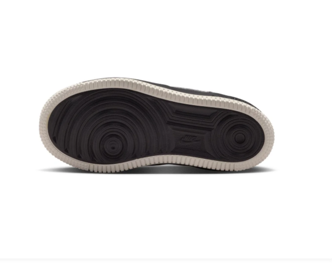 Nike Black Low-Top Sneakers with Cream Swoosh and Two-Tone Sole