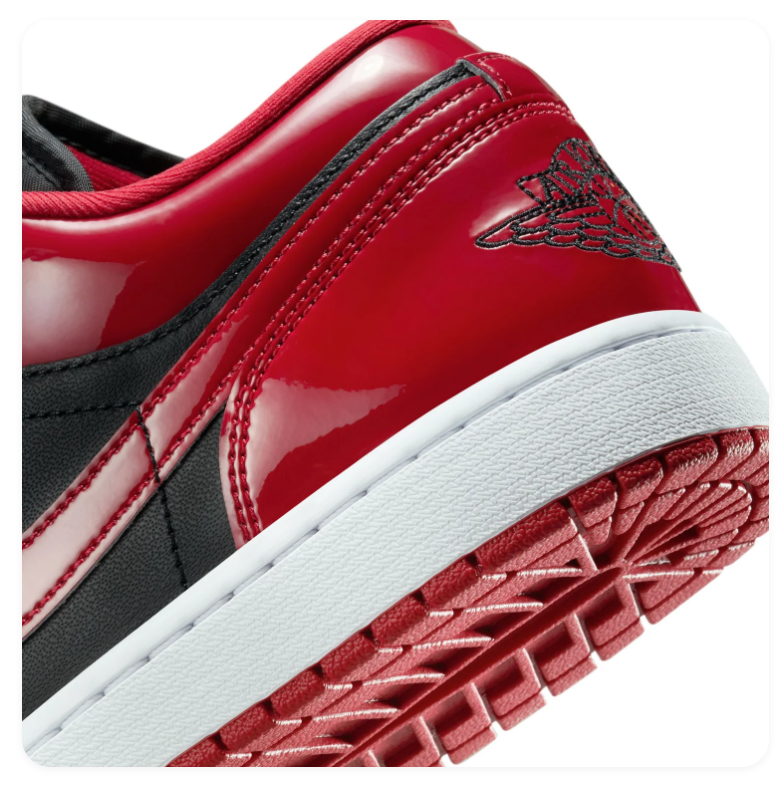 Air Jordan 1 Low Glossy Red and Black Sneakers