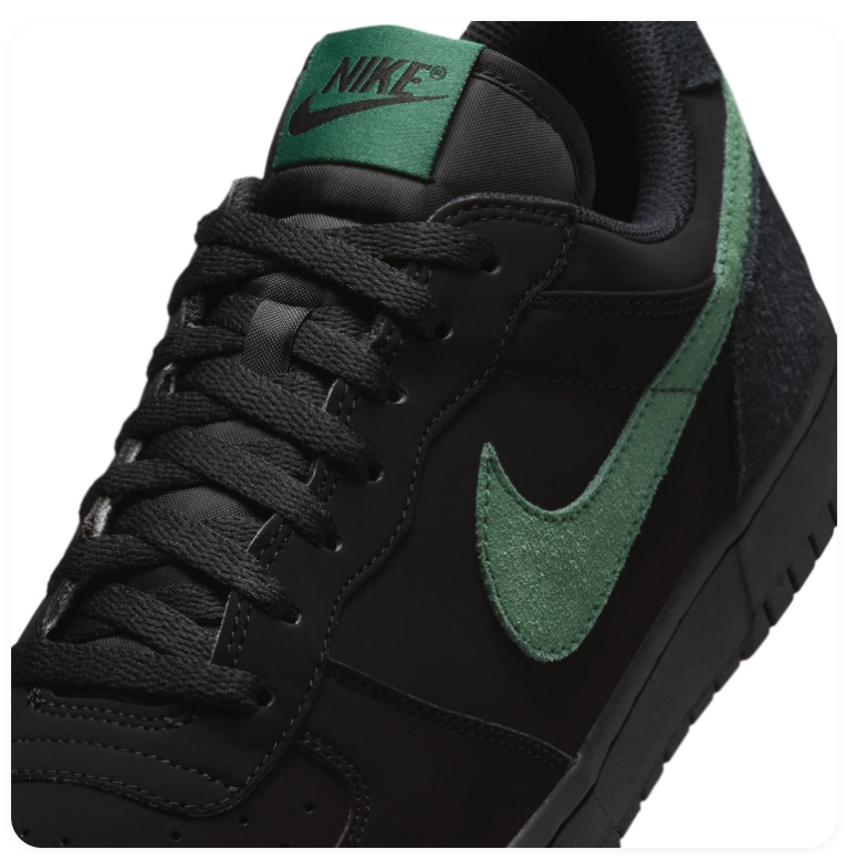 Nike Black Low-Top Sneakers with Green Swoosh