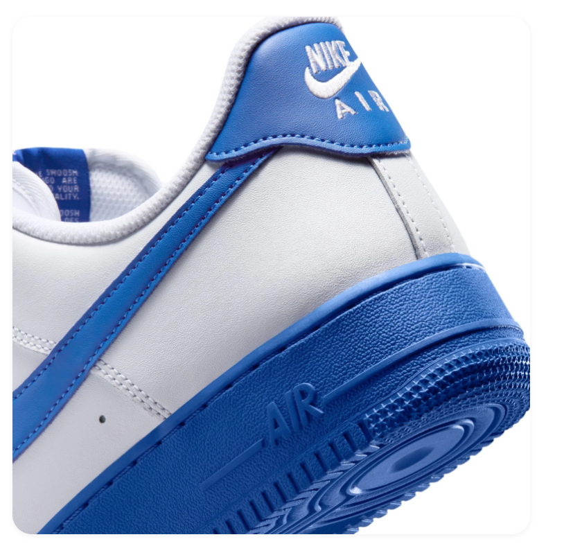 Nike Air Force 1 White Sneakers with Royal Blue Swoosh and Sole