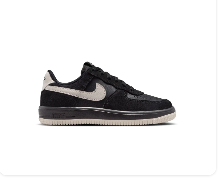 Nike Black Low-Top Sneakers with Cream Swoosh and Two-Tone Sole