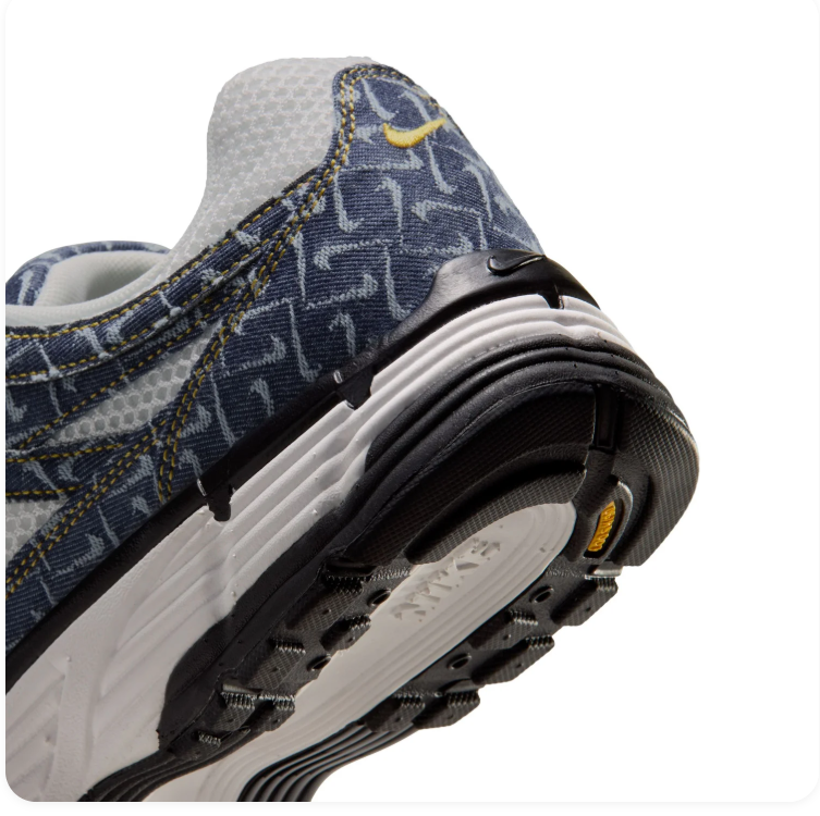 Nike Navy Patterned Mesh Sneakers with Yellow-Outlined Black Swoosh