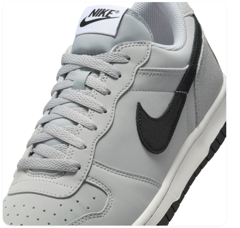 Nike Light Grey Low-Top Sneakers with Black Swoosh and Bold Heel Logo