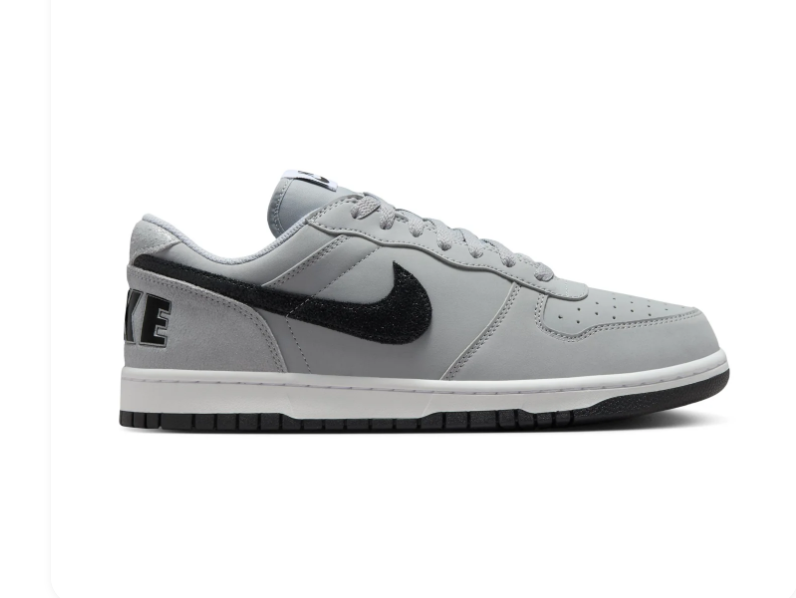 Nike Light Grey Low-Top Sneakers with Black Swoosh and Bold Heel Logo