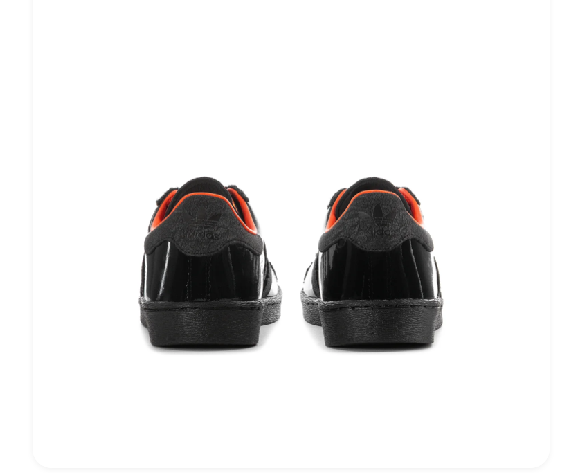 Adidas Black Glossy Low-Top Sneakers with Orange Lining and Graphic Tongue