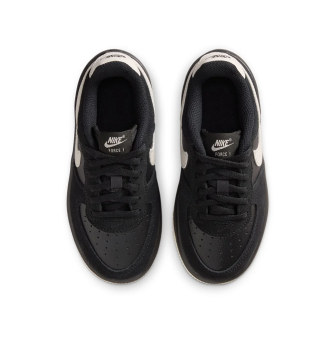 Nike Black Low-Top Sneakers with Cream Swoosh and Two-Tone Sole
