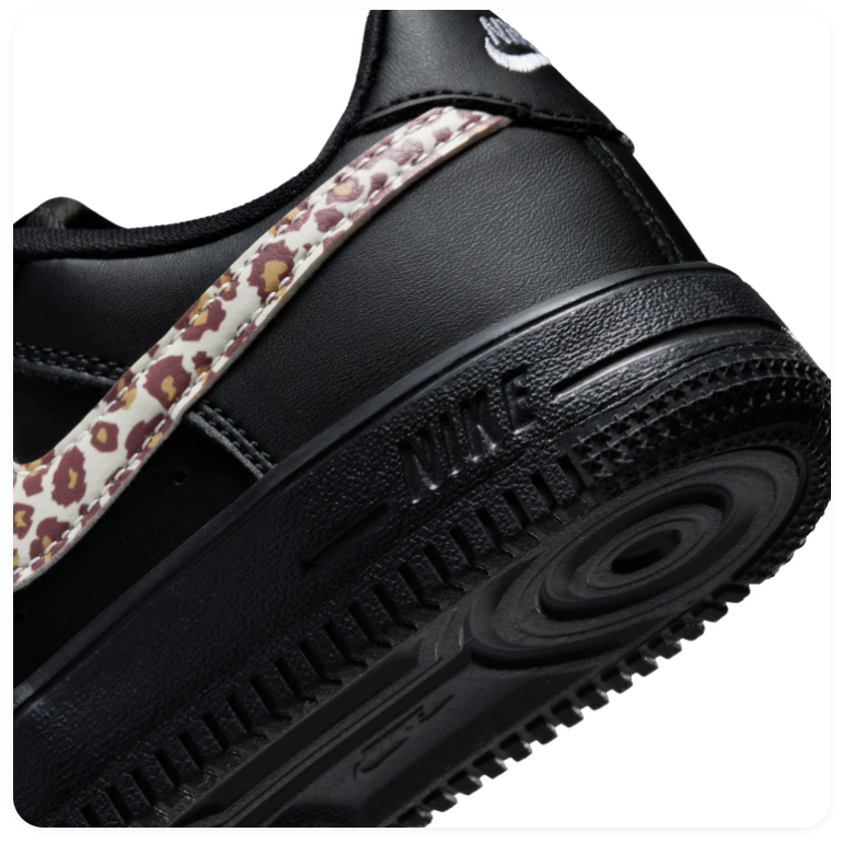 Nike Air Force 1 Black Low-Top Sneakers with Leopard-Print Swoosh