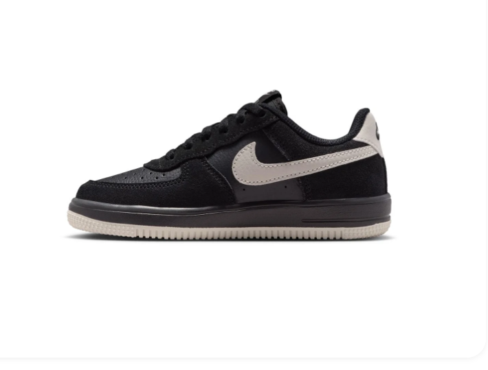Nike Black Low-Top Sneakers with Cream Swoosh and Two-Tone Sole