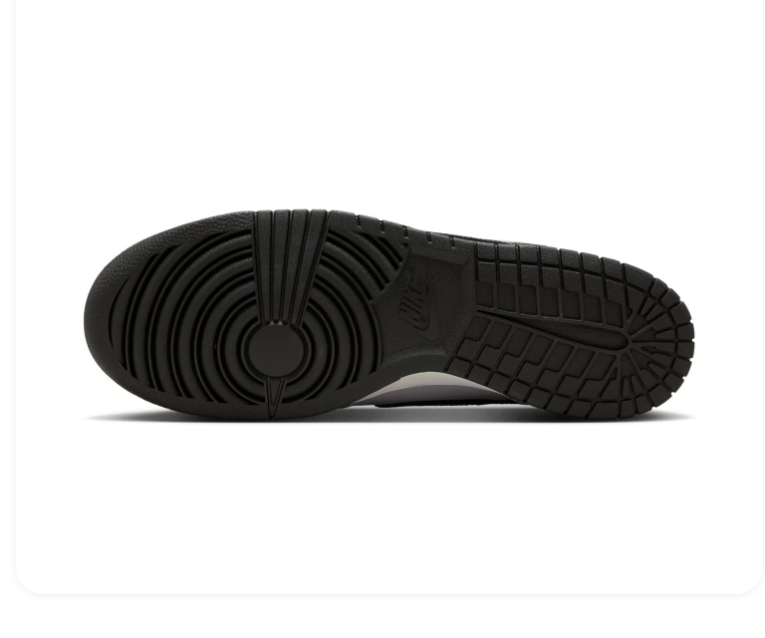 Nike Light Grey Low-Top Sneakers with Black Swoosh and Bold Heel Logo