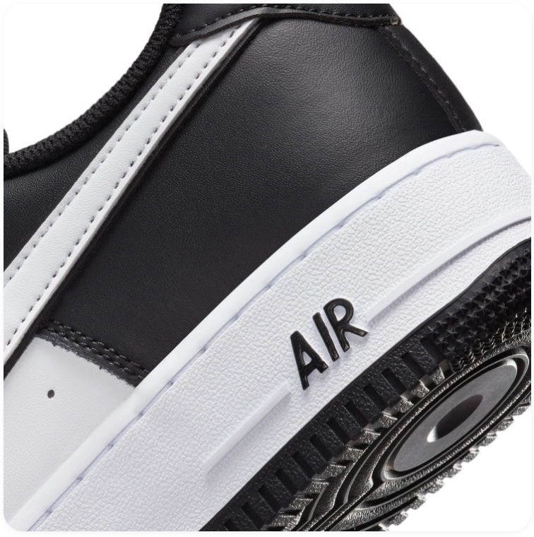 Nike Air Force 1 Black and White Sneakers with Silver Swoosh