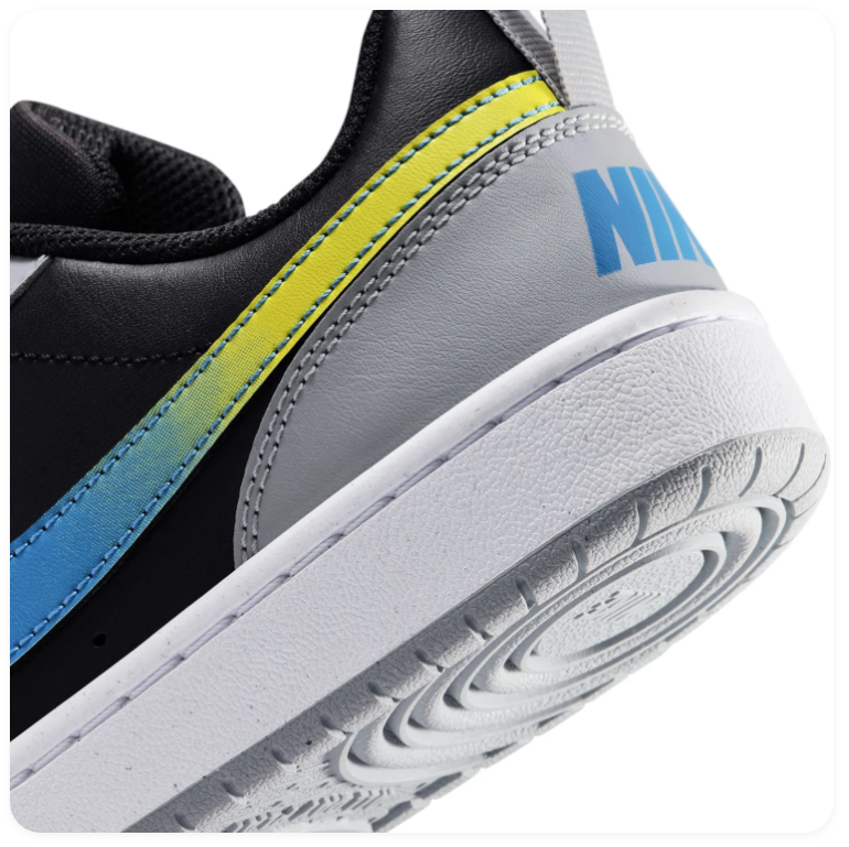 Nike Black and Grey Low-Top Sneakers with Blue-to-Yellow Gradient Swoosh