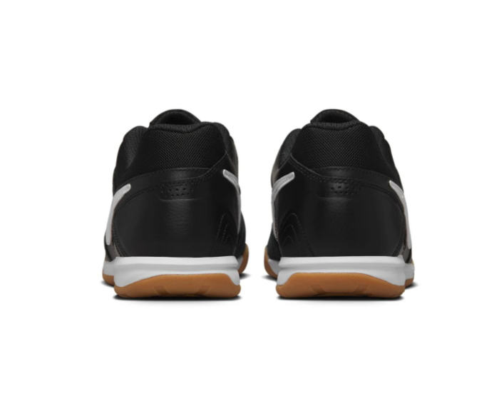 Nike Black Low-Top Sneakers with White Swoosh and Gum Sole