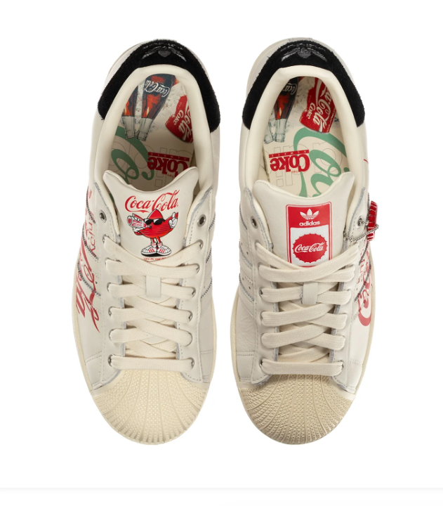 Adidas Superstar Cream Sneakers with Red Coca-Cola Graphics and Black Heel Tabs