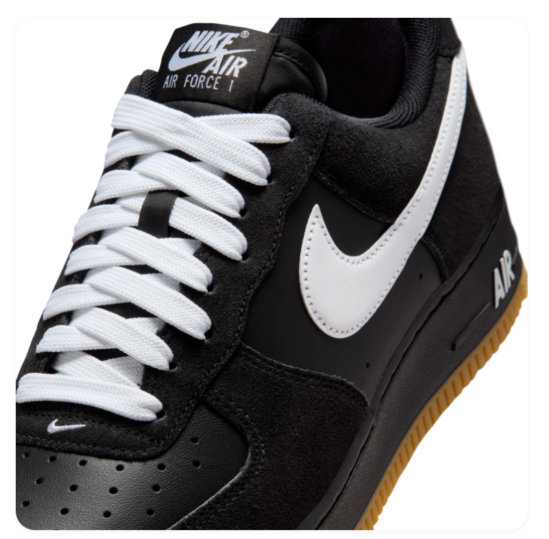 Nike Air Force 1 Black Sneakers with White Swoosh and Gum Sole