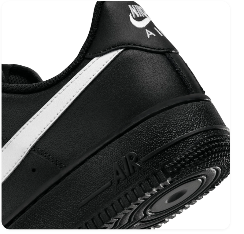Nike Air Force 1 Black Low-Top Sneakers with White Swoosh