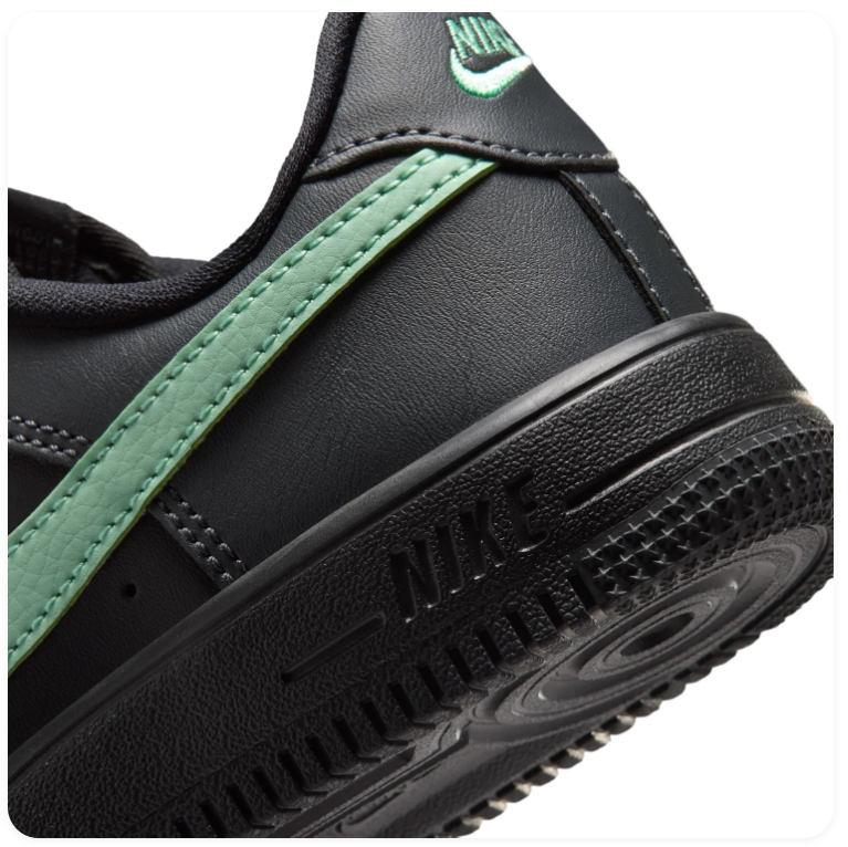 Nike Air Force 1 Black Low-Top Sneakers with Mint Green Swoosh