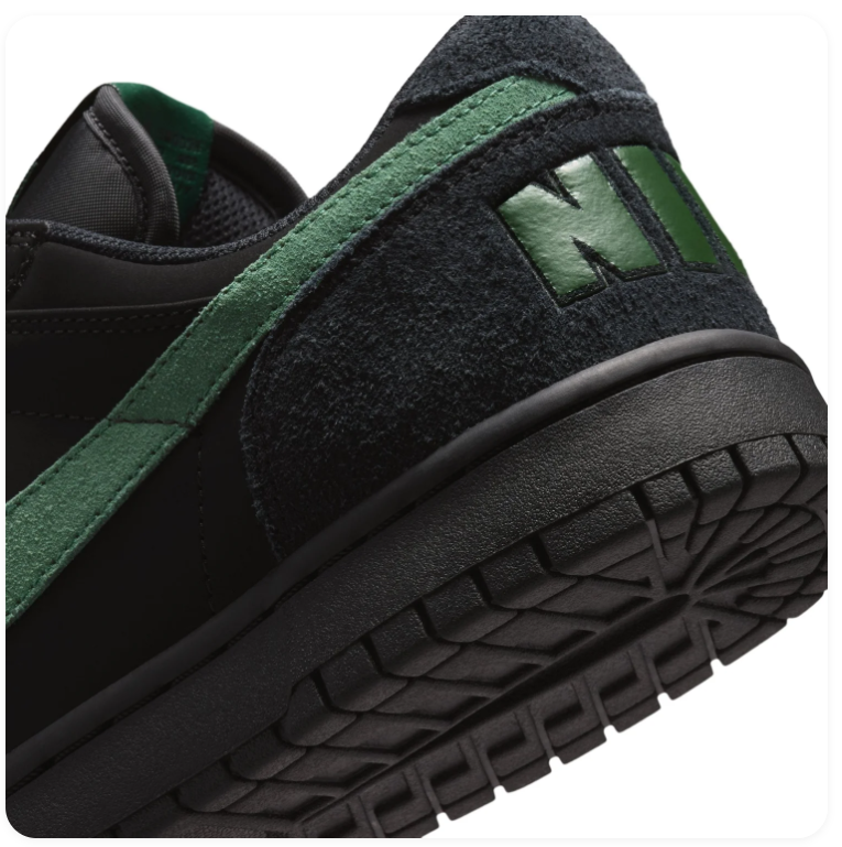 Nike Black Low-Top Sneakers with Green Swoosh