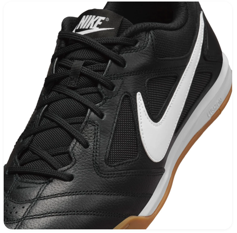 Nike Black Low-Top Sneakers with White Swoosh and Gum Sole
