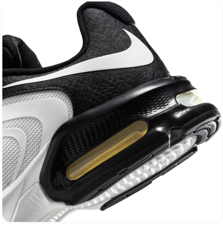 Nike Air Max White and Black Sneakers with Wave-Pattern Upper