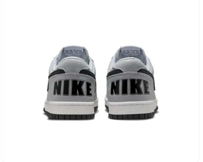 Nike Light Grey Low-Top Sneakers with Black Swoosh and Bold Heel Logo
